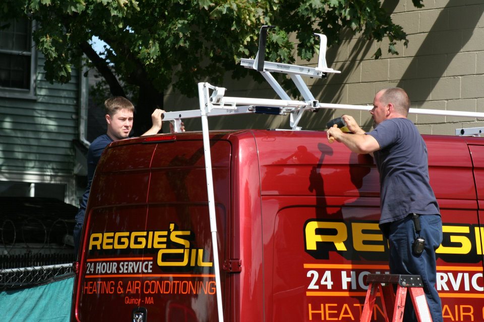 Reggie's Oil Service Van on South Shore, MA